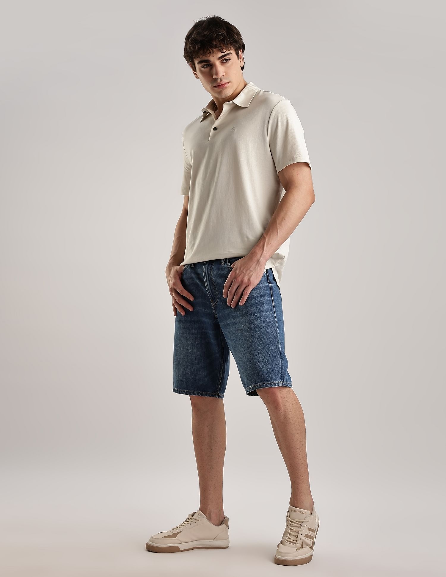 Calvin Klein Jeans Solid Regular-Fit Cotton Polo T-Shirt