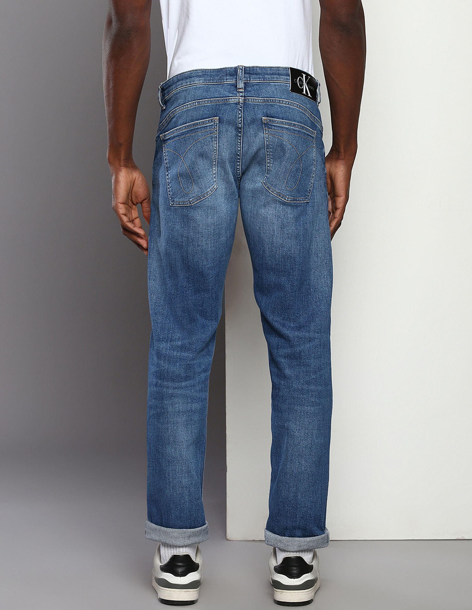 Calvin Klein Jeans Mid Rise Body Tapered Fit Jeans
