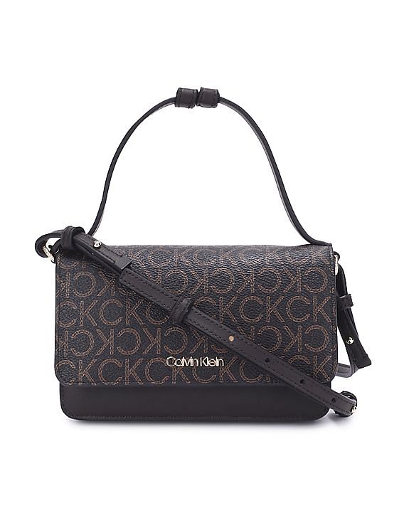 Buy Calvin Klein Women Beige Three Compartment Brand Monogram Sling Bag -  NNNOW.com