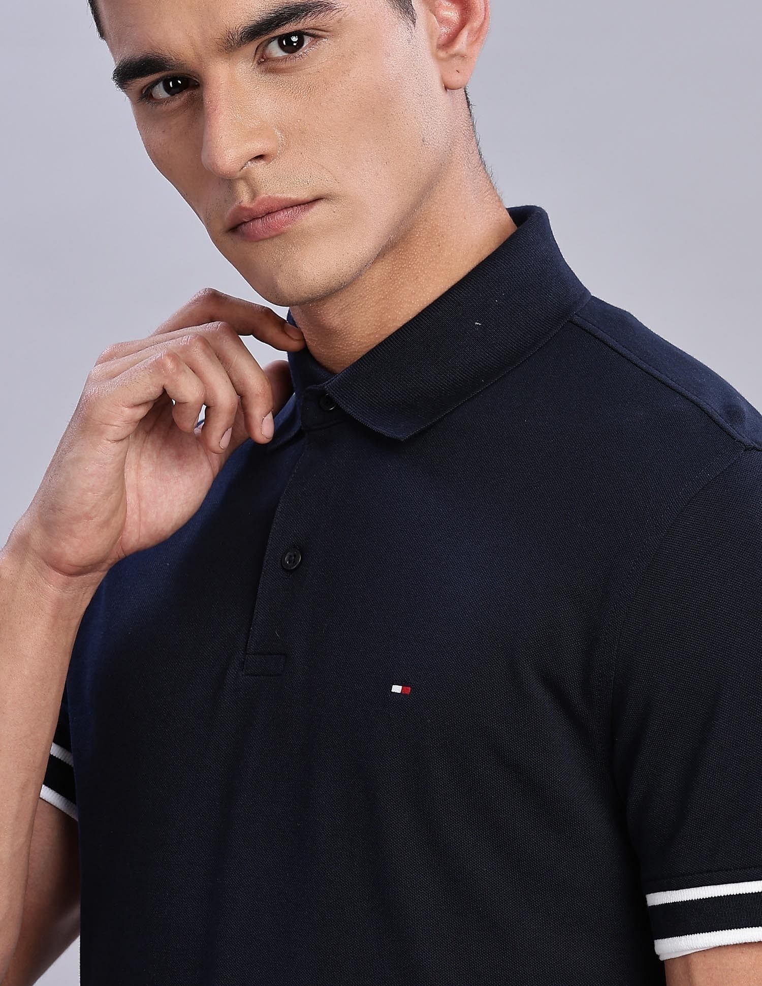 Tommy Hilfiger Mens Blue Solid Polo Shirt
