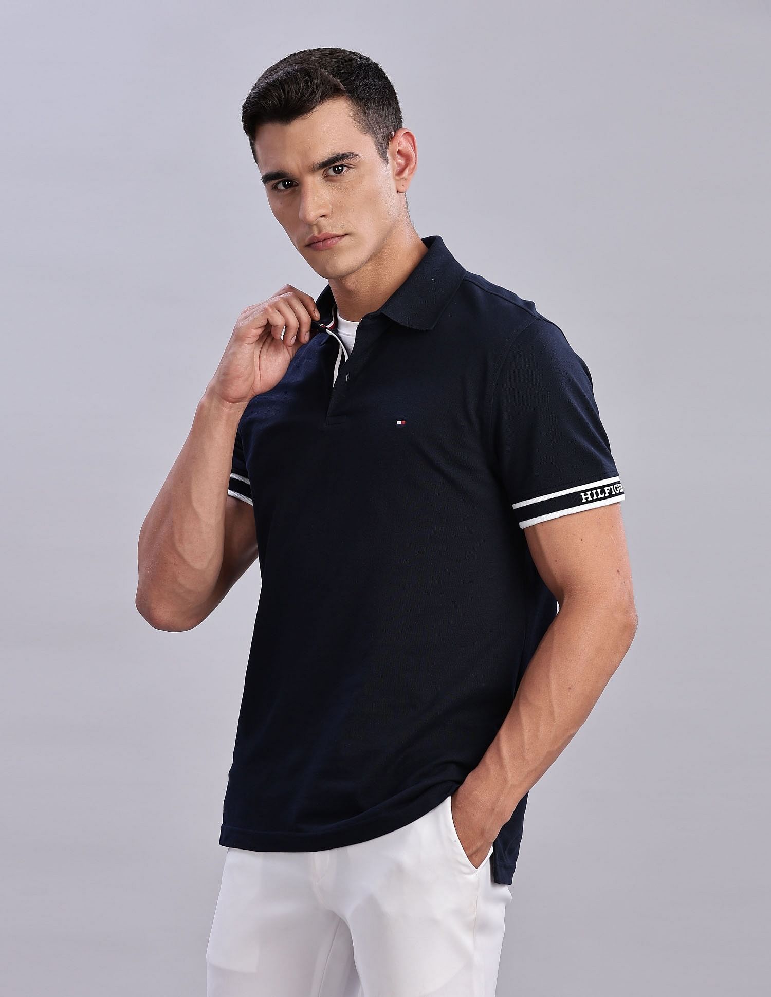Tommy Hilfiger Mens Blue Solid Polo Shirt