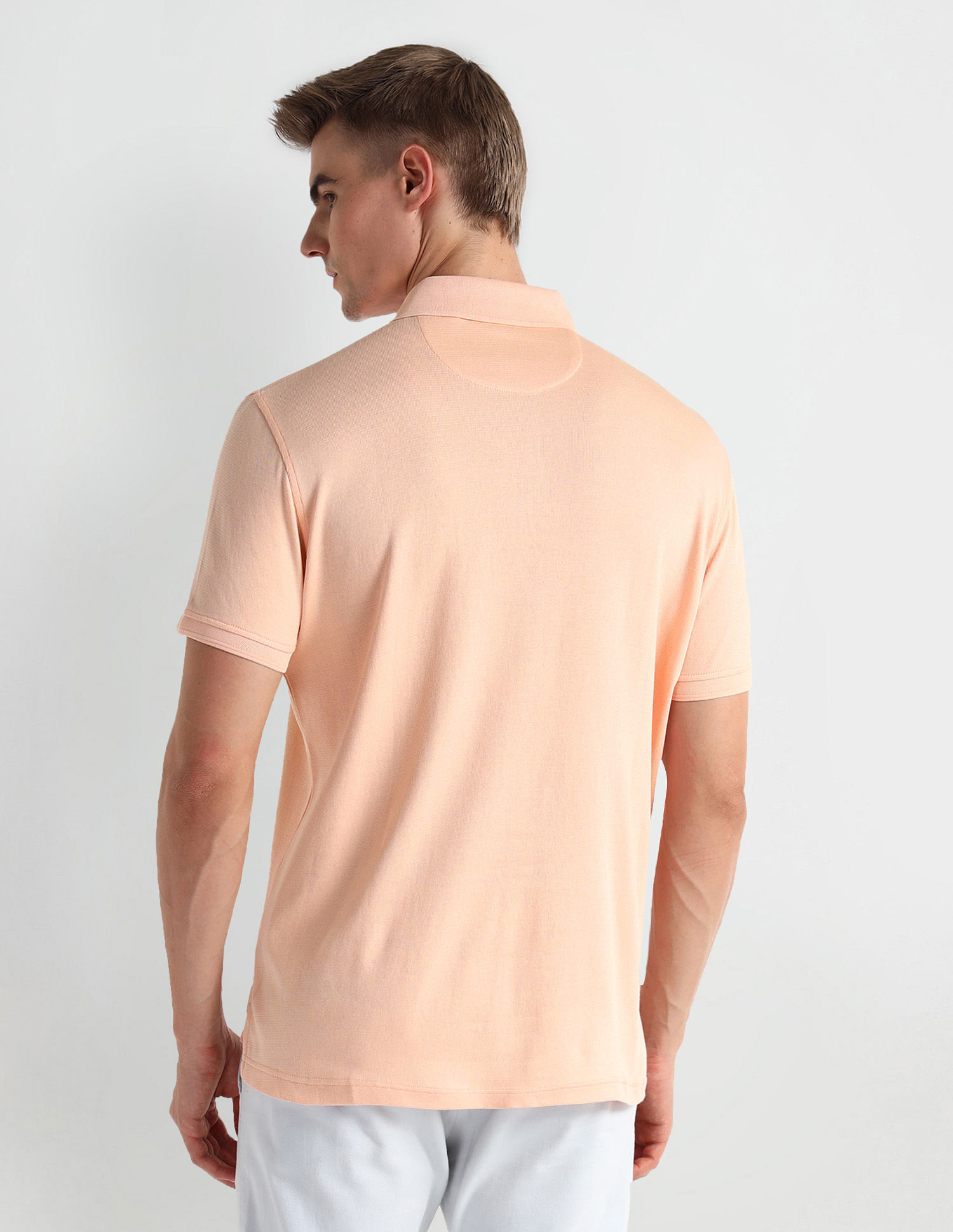 Arrow Patch Pocket Solid Polo Shirt