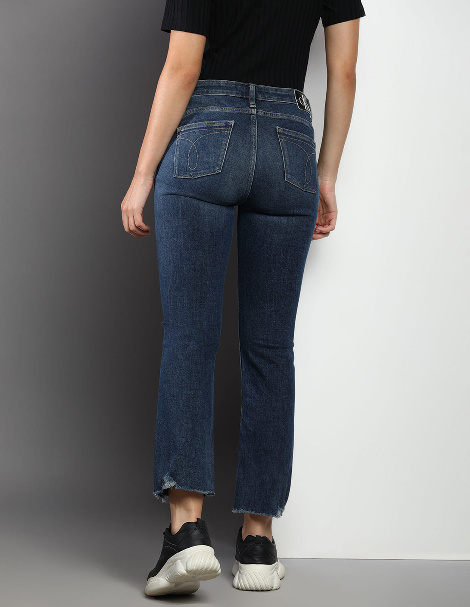 Buy Calvin Klein Jeans High Rise Frayed Hem Bootcut Jeans