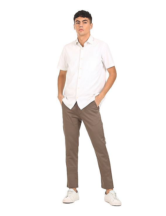 Buy Arrow Sports Mid Rise Solid Casual Trousers - NNNOW.com