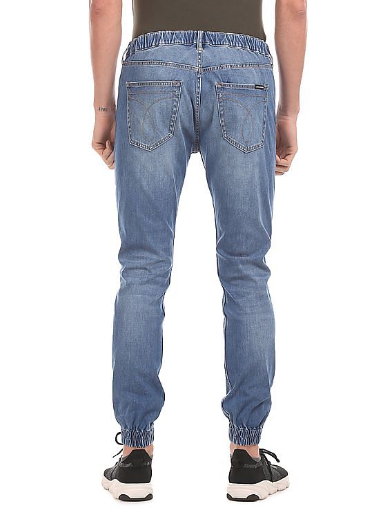 Calvin Klein Men Blue Stone Wash Four-Way Stretch Jogger Jeans