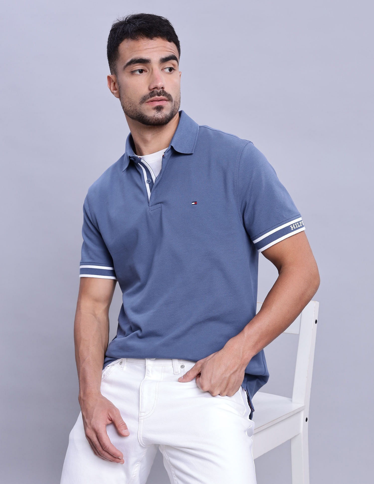 Tommy Hilfiger Mens Blue Solid Polo Shirt