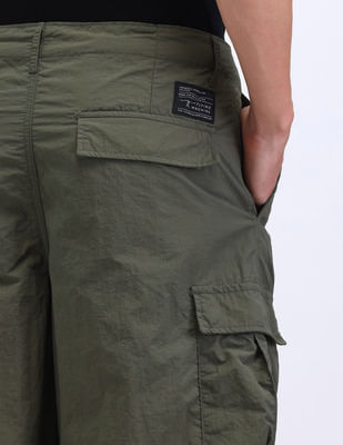 Buy Flying Machine Loose Fit Solid Cargo Trousers