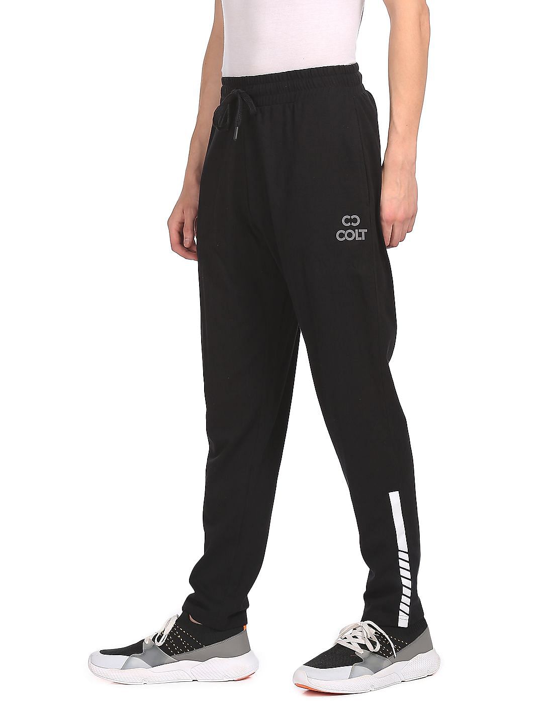 Buy Colt Men Black Mid Rise Solid Track Pants - NNNOW.com