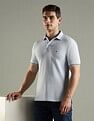 Tommy Hilfiger Solid Slim Fit Cotton Polo T-Shirt