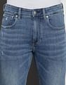 Calvin Klein Modern Tapered Fit Distressed Jeans