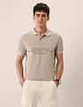 U.S. Polo Assn. Denim Co. Brand Embossed Muscle Fit Polo Shirt