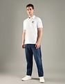Tommy Hilfiger Solid Regular Fit Cotton Polo T-Shirt
